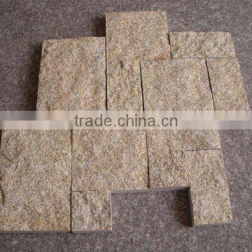 yellow granite stone wall covering