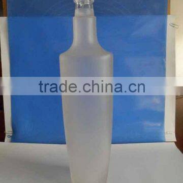 750 ml glass frosted vodka bottle with plastic lids and inner lids