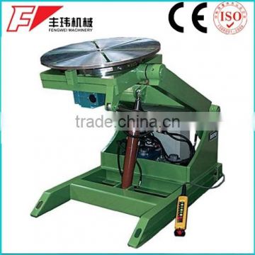 Tilting welding positioner with lifting device