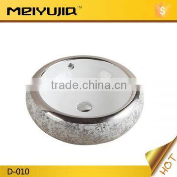 Golden round counter top bathroom art basin