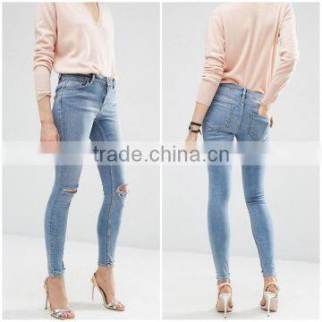 OEM service sales winter comfortable cotton jeans pent stonewash shredded knees for lady