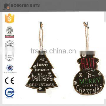 black wooden tree and snowman christmas decoration in home