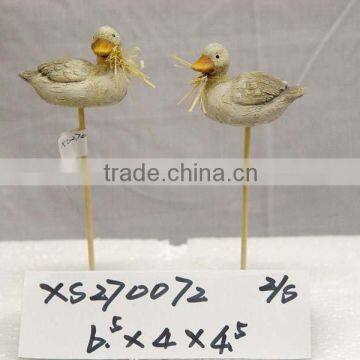 Terracotta duck on stick,2asst.