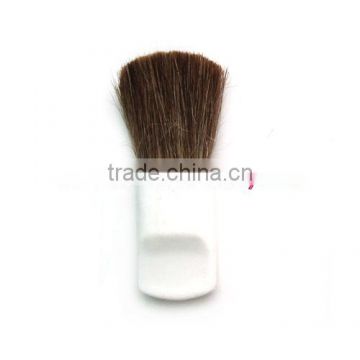 white handle, brown hair blush brush