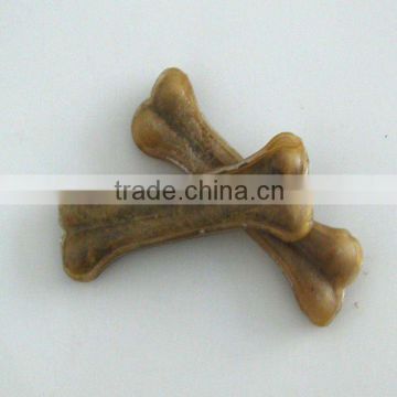 Dog chewing pressed bones