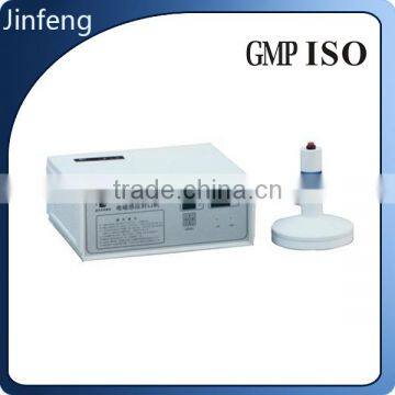 Good Performance Pet Bottle Aluminum Foil Lid Sealing Machine photo-2