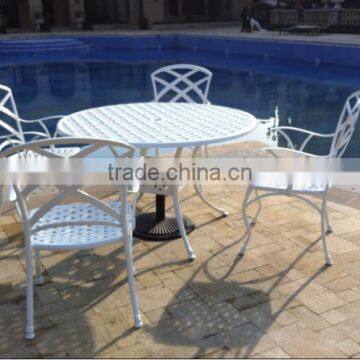 antique cast aluminum table and chairs