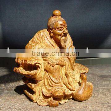 root carving Confucius