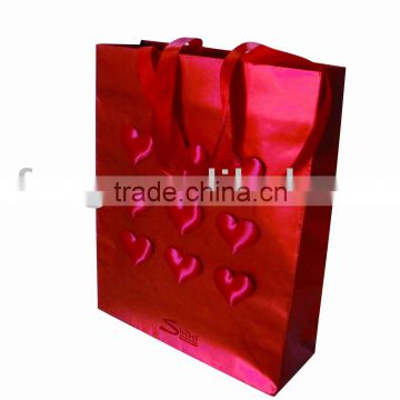 2010 paper bag with ribbon