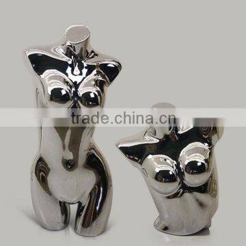 chromed female torso