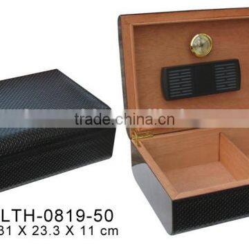 black wooden cigar box