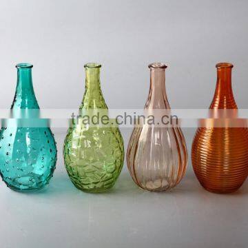 glass bottle with four styles