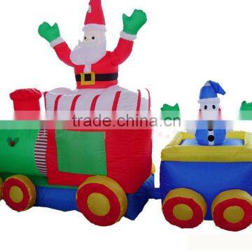 Inflatable Christmas snowman and santa Claus on train toy