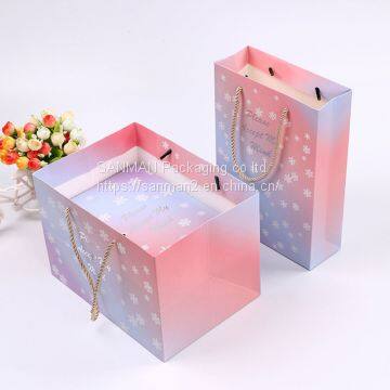 Custom pink paper packaging bag with logo