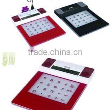 mouse pad with calculator and speaker