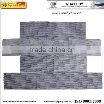 Black stone comb chiseled wall cladding