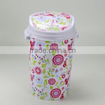 Plastic waste bin with lid