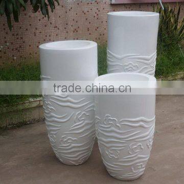 Modern white fiberglass planter