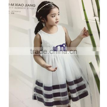 Children sleeveless satin ribbon decorated white dress