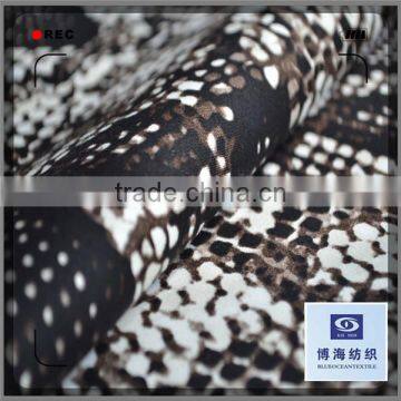 snake skin printed composition of cotton satin fabric