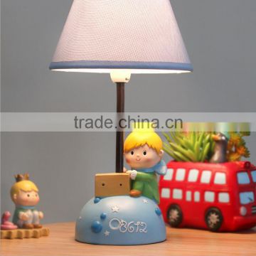 Creative cartoon children reading prince shaped resin led table lamp