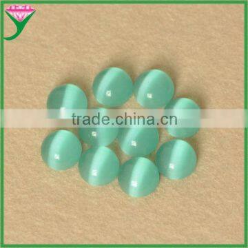 wuzhou hot sale synthetic light green flat round cabochon cat eye glass gem stone