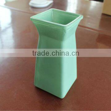 Printed green glass vase