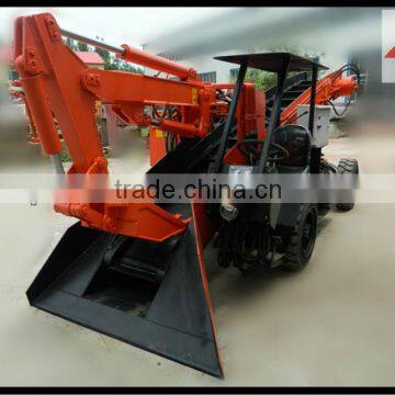 mucking backhoe wheel loader with hydraulic breaker