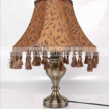 Antique brass table lamp with imitation sheepskin