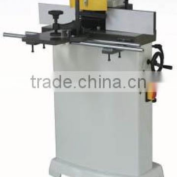 Stand style single spindle wood shaper with sliding worktable 001