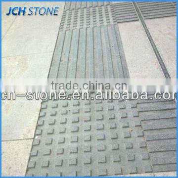 Granite paving different style sidewalk tile