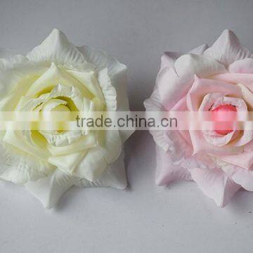 white and pink DIY rose flower heads for wedding wall