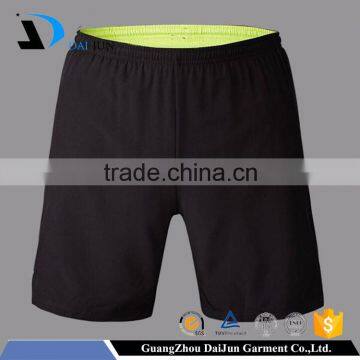 Daijun OEM black polyester reverisible american football pants