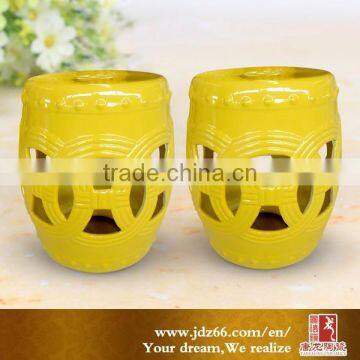 Good-quality yellow color carved Chinese ceramic stools