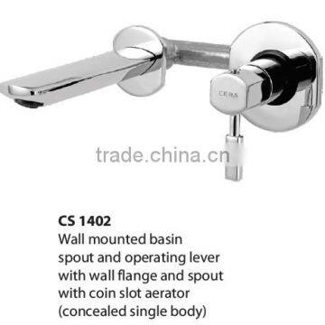 Wall mounted basin spout and operating lever with wall flange and spout with coin slot aerator