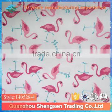 Pink swans printed swimwear fabric