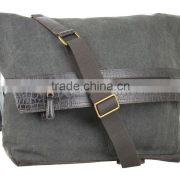 2013 Features an adjustable canvas messenger bags with leather trim