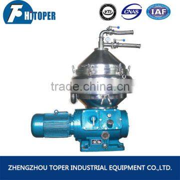 Disk stack bowl centrifuge oil-water-sludge separator