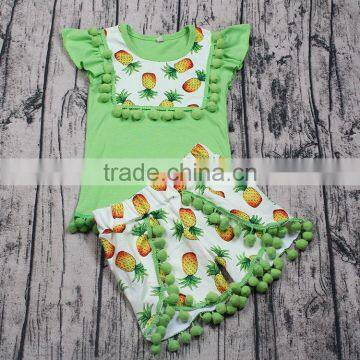 Latest design cute pineapple print wholesale baby girls outfits boutiques with pom pom green summer 2pcs shorts clothing set new