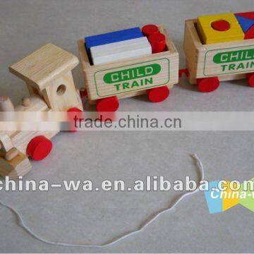 wood train toy locomotive and wagons with blocks