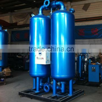 Heated regenerative desiccant compressed air dryer