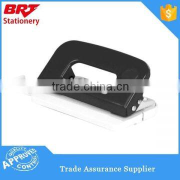 Standard metal paper hole punch