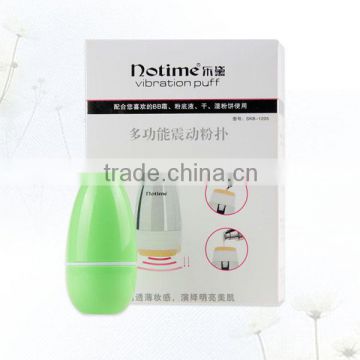 Vibrating powder makeup face massage machine