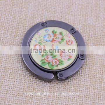 Promotion round black bag purse hanger/ flower bag purse holder with epoxy