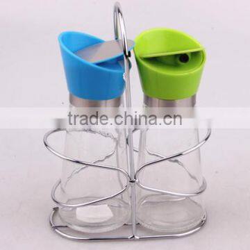 glass jar set for oil with metal stand