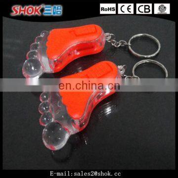 Souvenir cute foot flashing led keychain