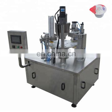 Rotary type plastic cup filling sealing machine