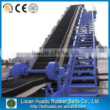 Portable sidewall sloping bucket elevator conveyor belt