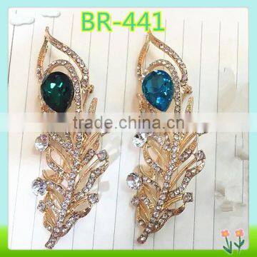 Leaf shape crystal and rhinestone brooches for new collection