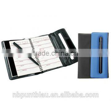 Business office organizer with pen